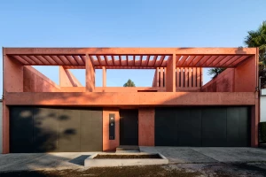 Estudio MMX interweaves open spaces throughout porous pigmented concrete villa Estudio MMX interweaves open spaces throughout porous pigmented concrete villa